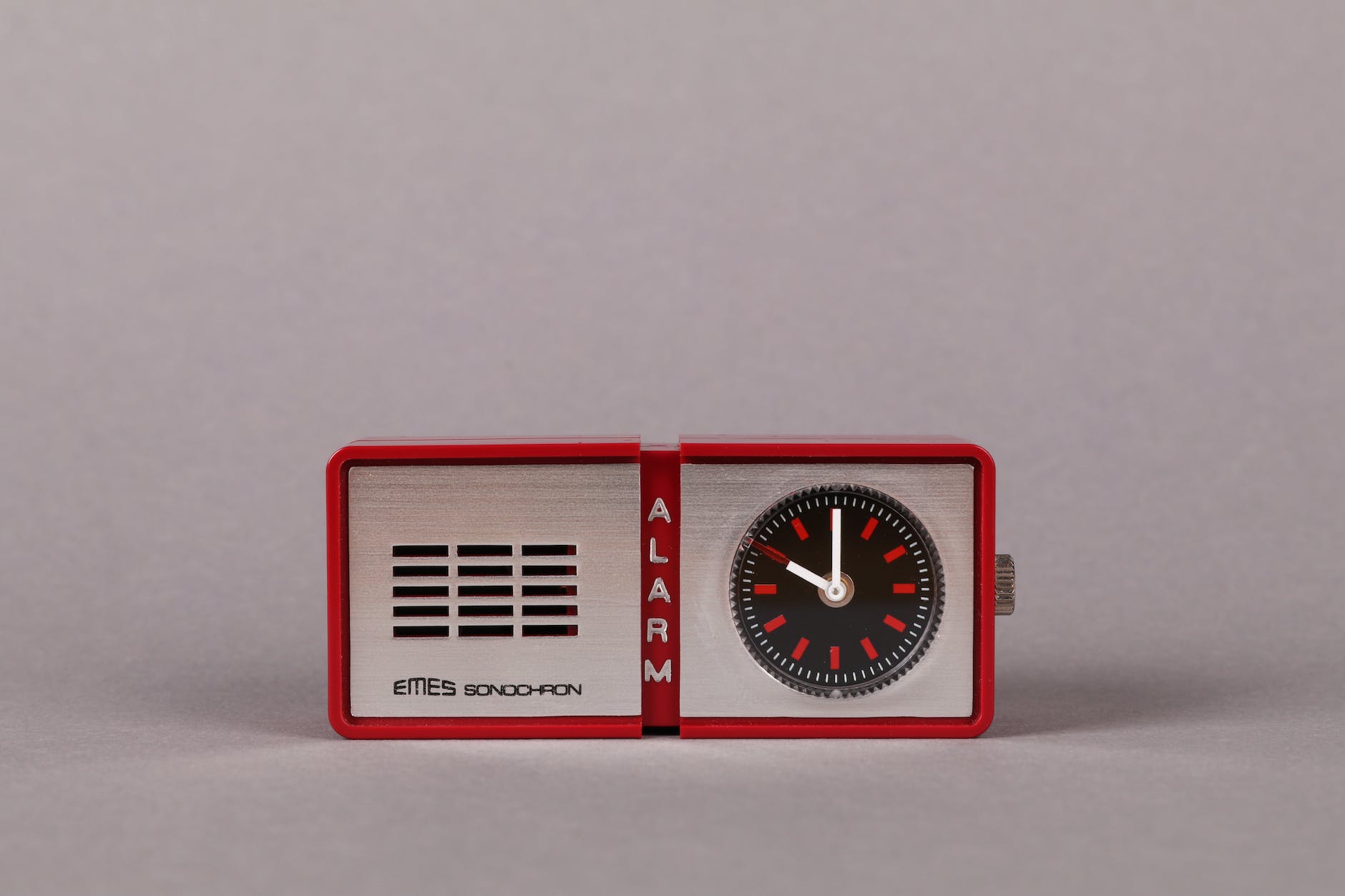 close up shot of a red alarm clock